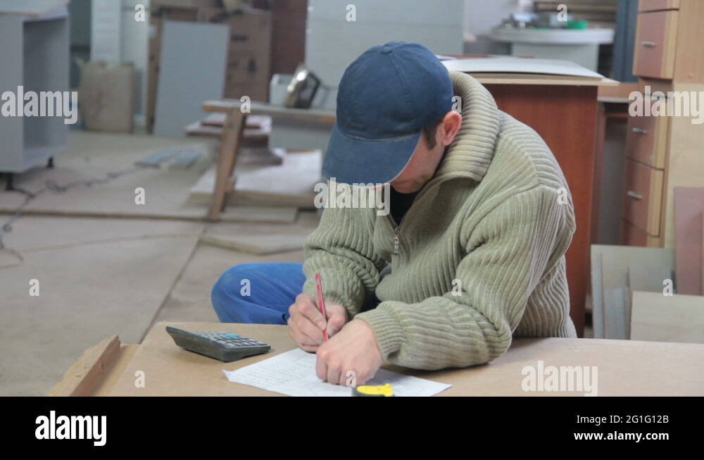 carpenter calculating layout dimensions Stock Video Footage Alamy