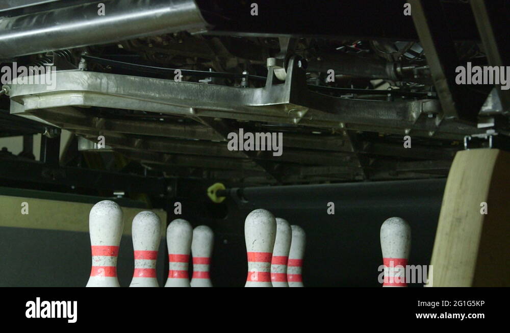 Pinsetter reset bowling pins Stock Video Footage Alamy
