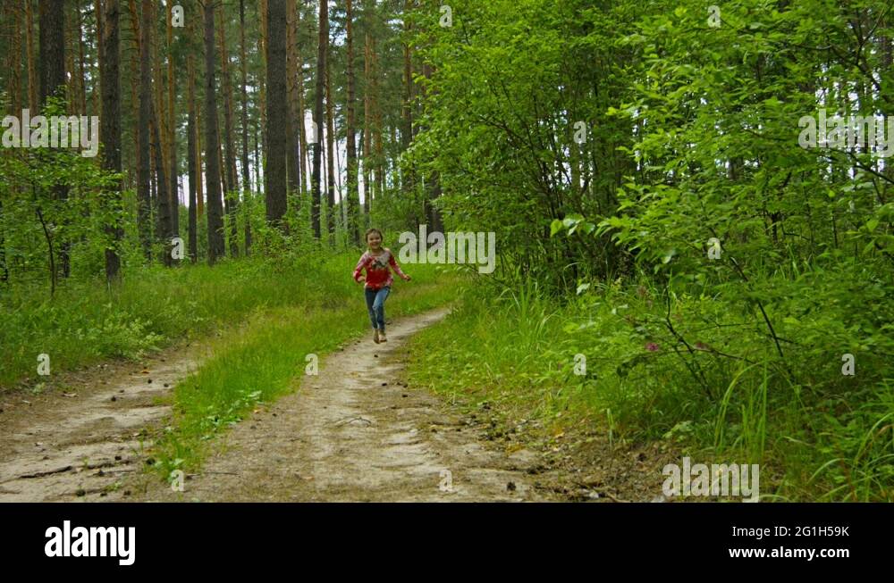 Kid running in wood Stock Videos & Footage HD and 4K Video Clips Alamy