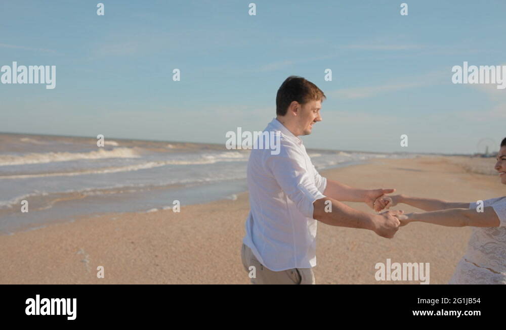 Young people circling holding hands Stock Video Footage Alamy