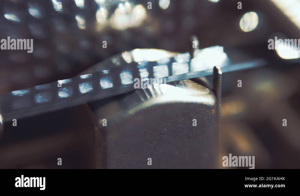 The cassette tape is pressed about the head of player and take