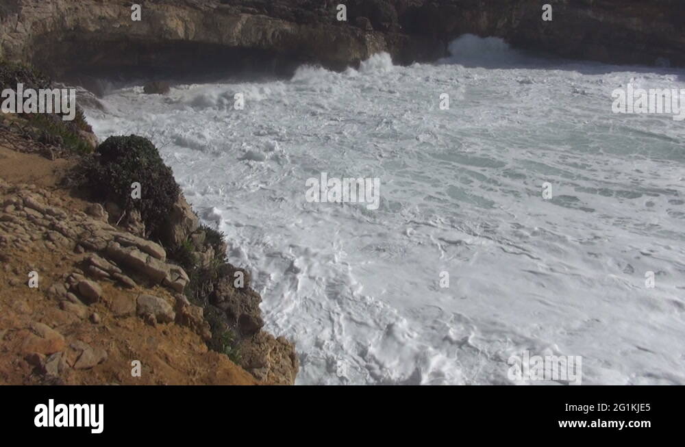 How formed the caves by the ocean Stock Video Footage - Alamy