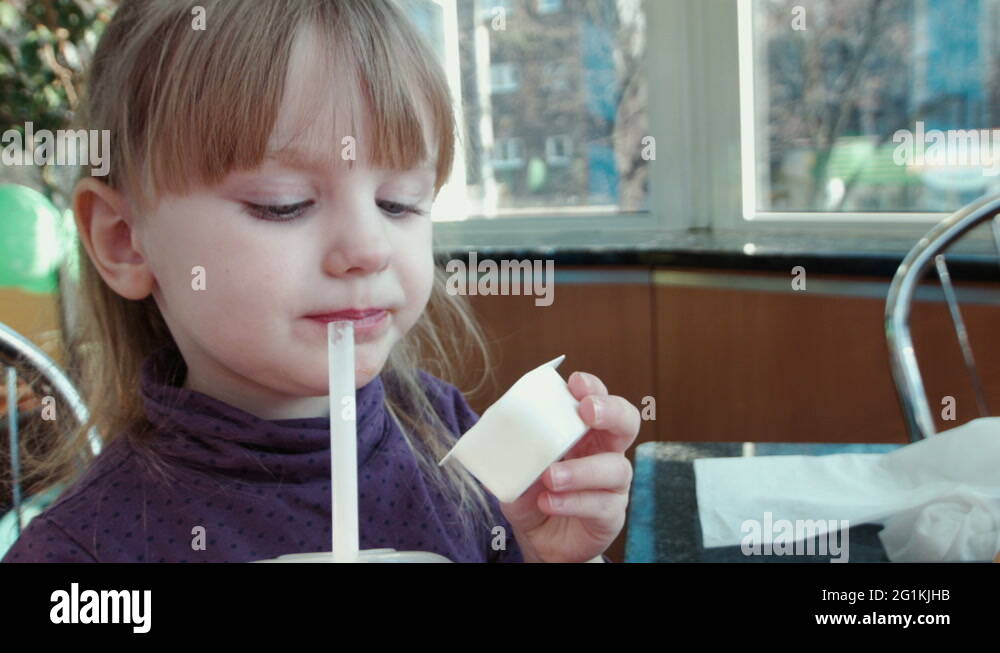 The Little Girl Licks Sauce Stock Video Footage Alamy