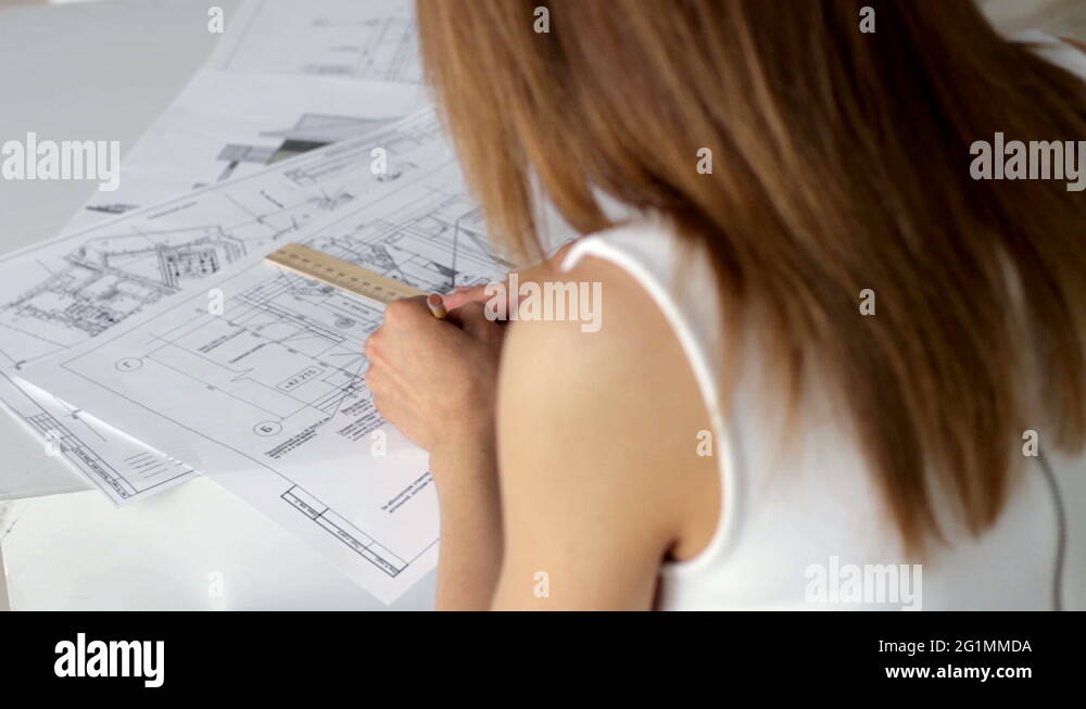 Architect Woman drawing project Stock Video Footage Alamy