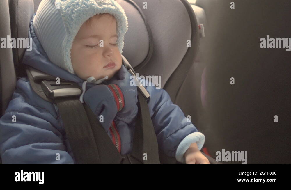 Baby sleeping in car Stock Videos & Footage HD and 4K Video Clips Alamy