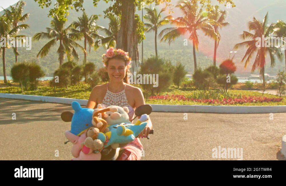 Girl on moped Stock Videos & Footage HD and 4K Video Clips Alamy