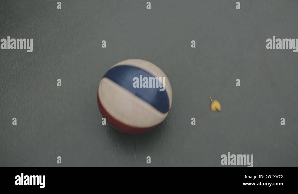 Ball rolling on the ground in basketball court Stock Video Footage Alamy
