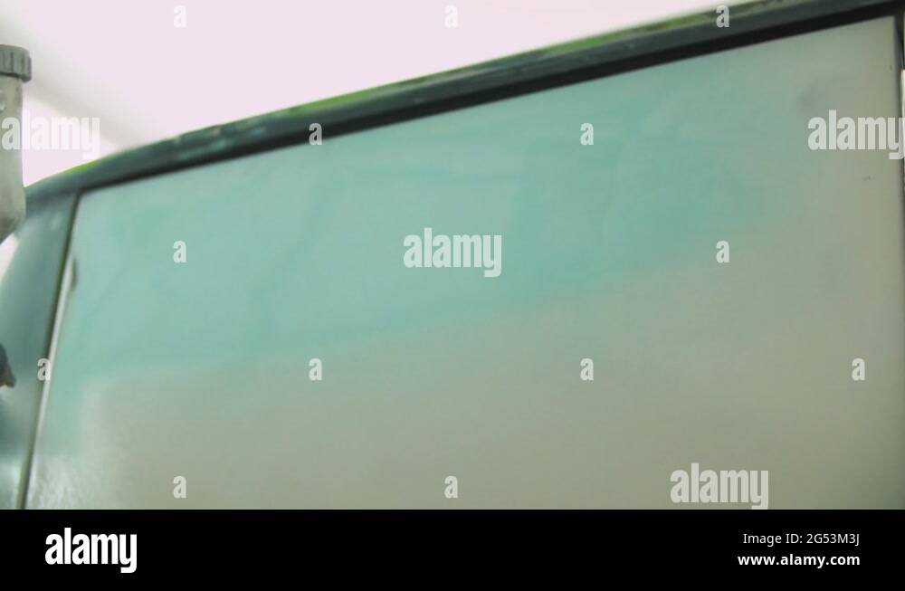 The process of priming the car before applying the paint. Car repair