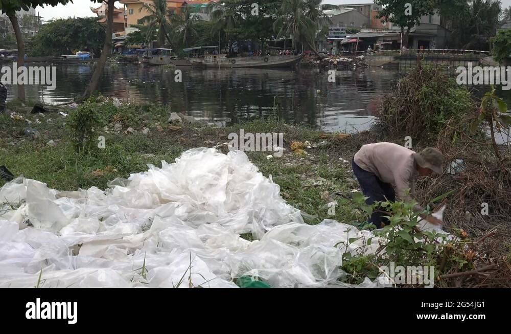 Vietnam Asia separating plastic recycling poverty polluted river city ...