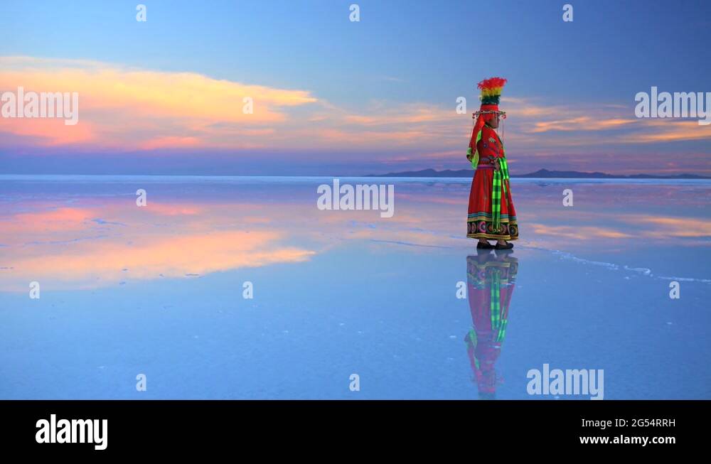 Latin American female in Bolivian National traditional dress on Salar ...