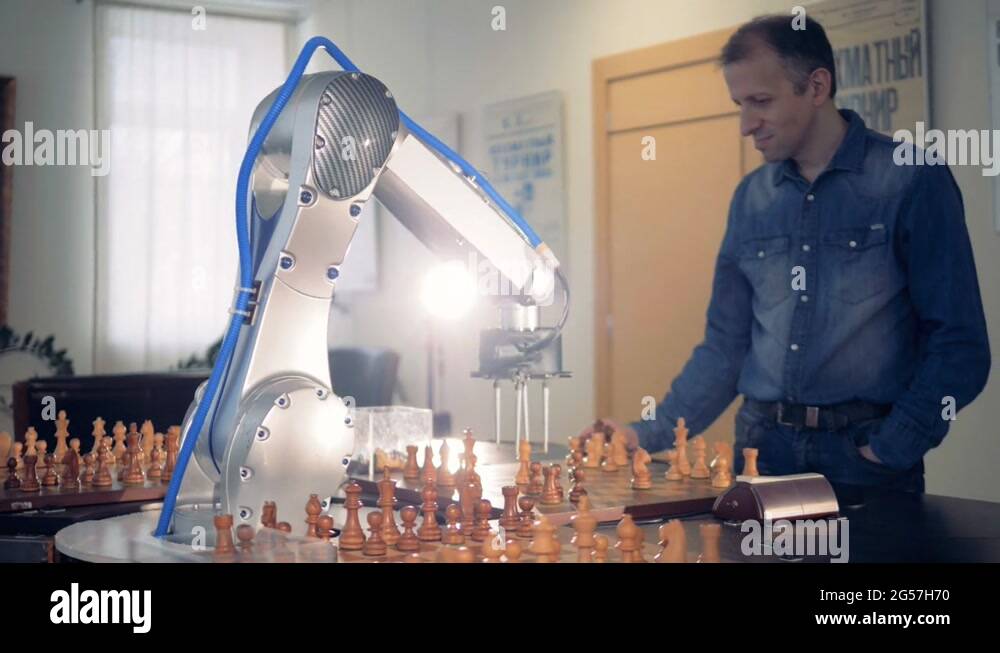 Robot hand manipulator moves the chess figure. Futuristic concept ... Chess Moves