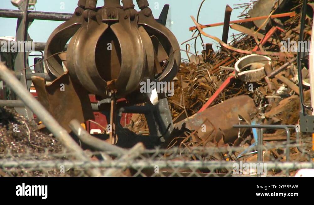 the environment, junkyard, metal recycler grapple, 12 Stock Video