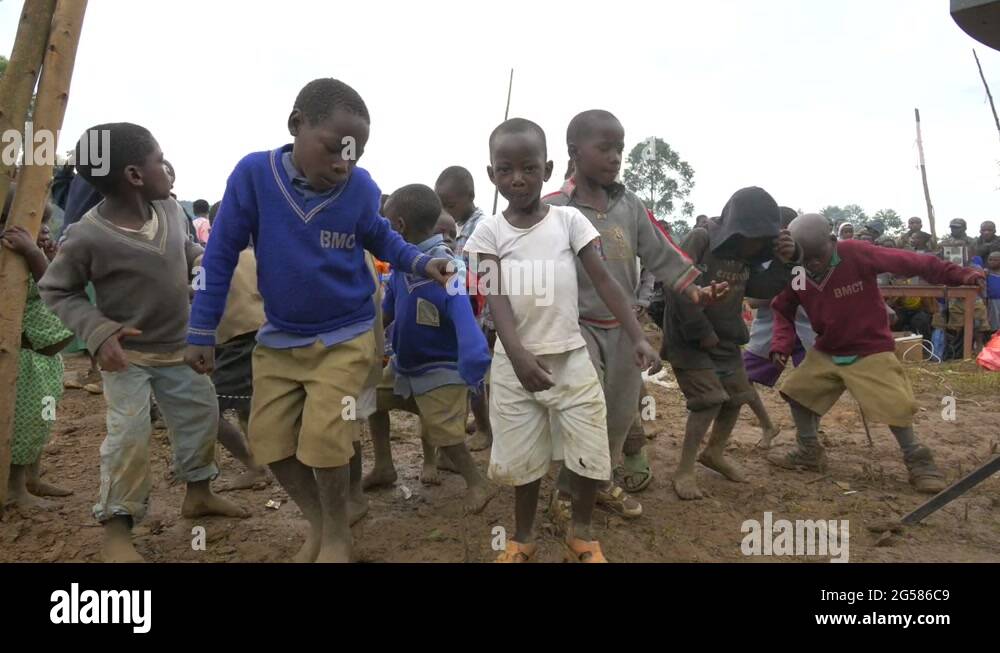 African boys dancing in mud Stock Video Footage Alamy