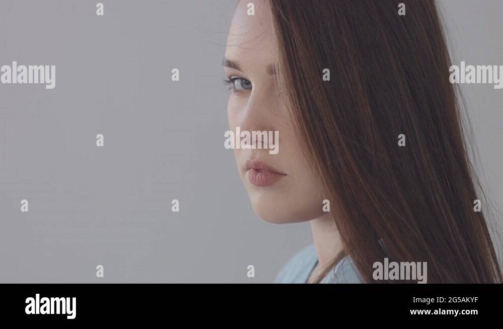 young baby face model in studio. Long straight hair blue eyed model ...
