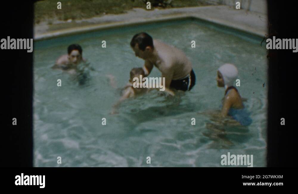 NORTH HOLLYWOOD CALIFORNIA-1961: Man In Swimming Pool With Two Boys And ...