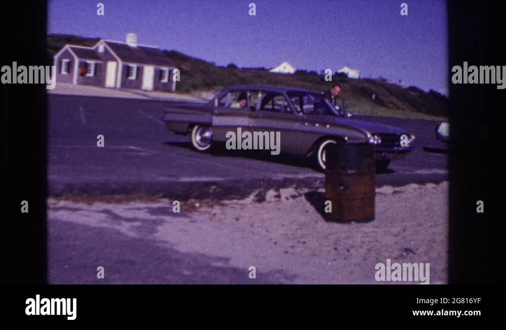 ROCKAWAY BEACH NEW YORK USA1967 Two People Entering A Car That Was