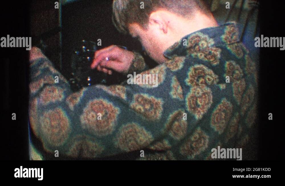 TOLEDO OHIO 1968 Christmas Eve Dinner Dad And Son Enjoying The Arrival toledo-ohio-1968-christmas-eve-dinner-dad-and-son-enjoying-the-arrival