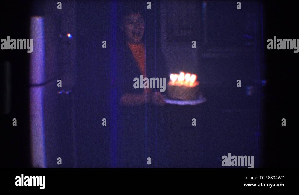 TOLEDO OHIO1968 Lady Walks Through Dark Kitchen To Put Birthday Cake