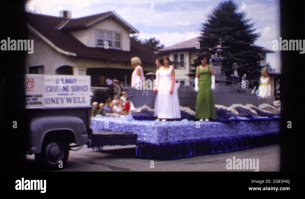 MABEL MINNESOTA1969 Women In Dresses Wave On Parade Float With Battleship Then Stock Video