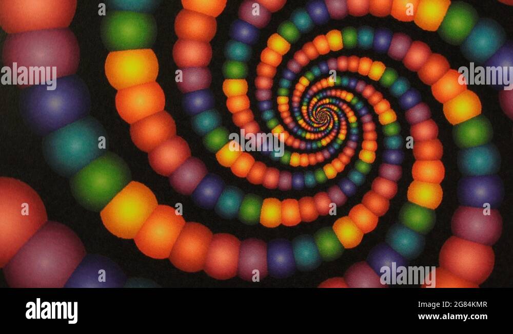 An Optical Illusion Of A Rainbow Amount Of Colors Of Balls Spinning In