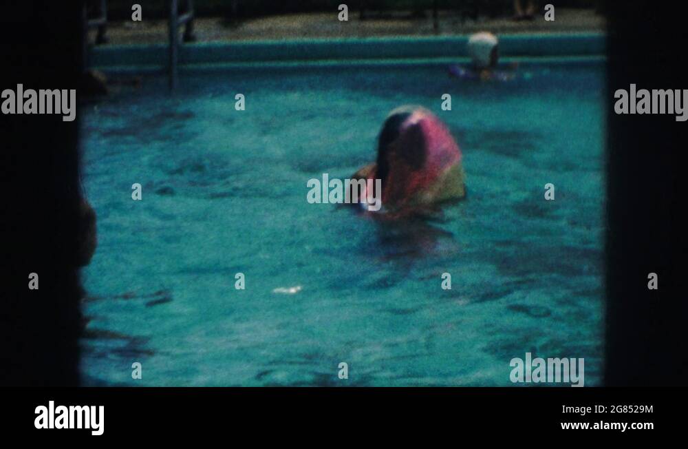 KANSAS CITY MISSOURI1959 Woman With A Swim Cap In A Public Swimming Pool With Stock Video