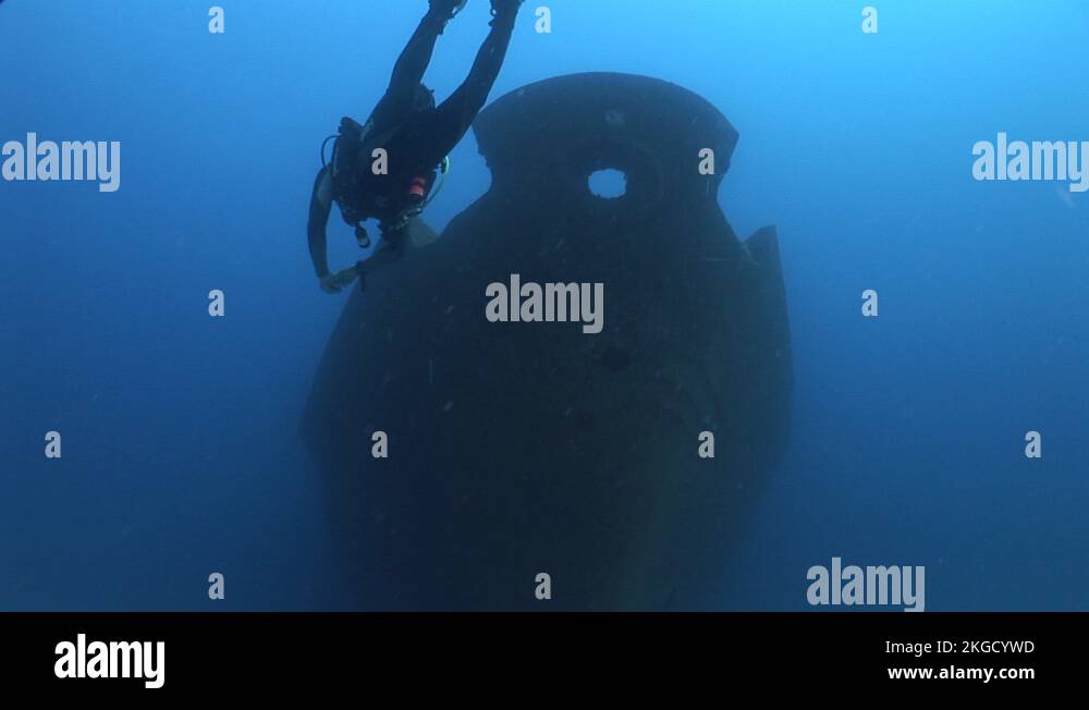 scuba diver underwater exploring the shipwreck underwater ship wreck