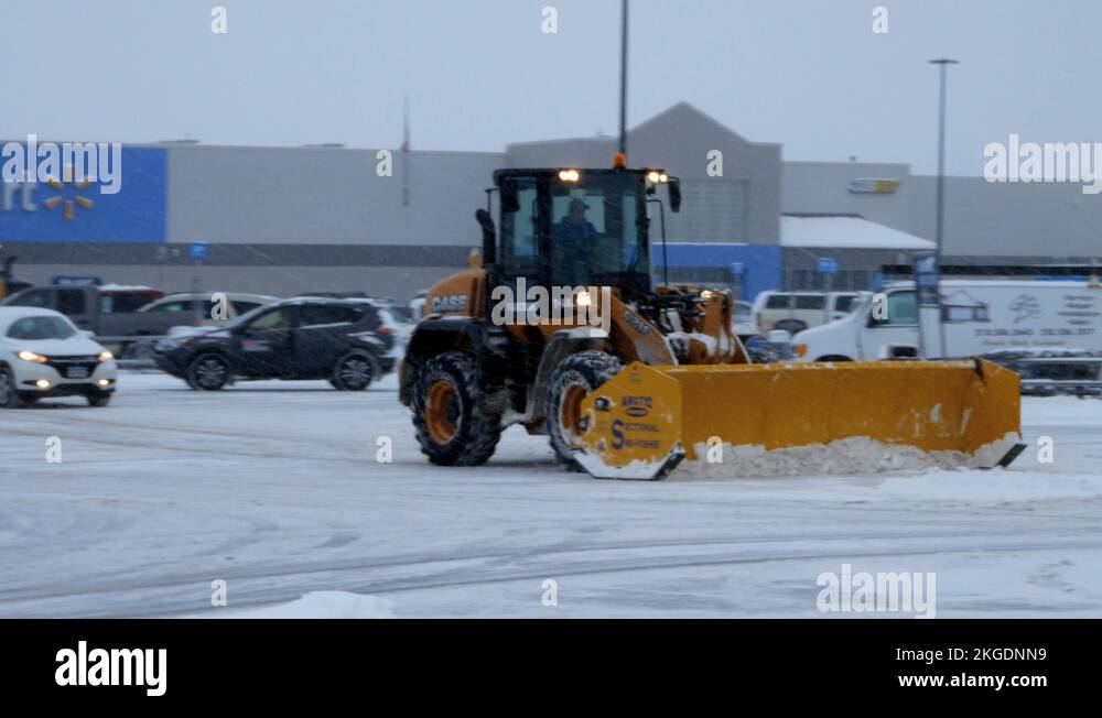 BEMIDJI, MN DEC 27, 2018 Snow removal machine clearing Walmart