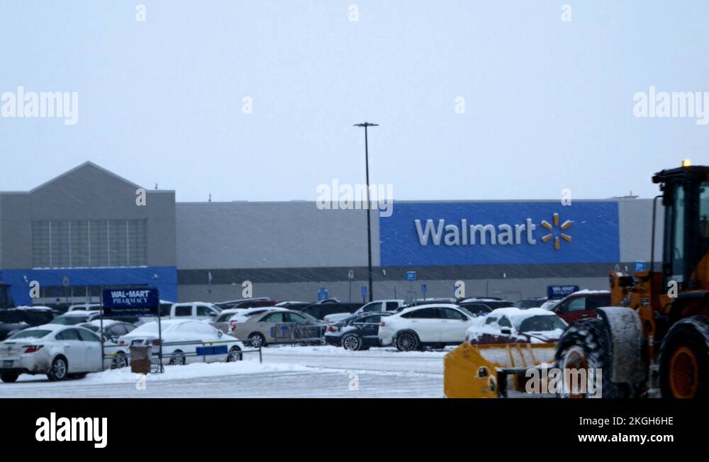 BEMIDJI, MN DEC 27, 2018 Snow removal machine clearing Walmart