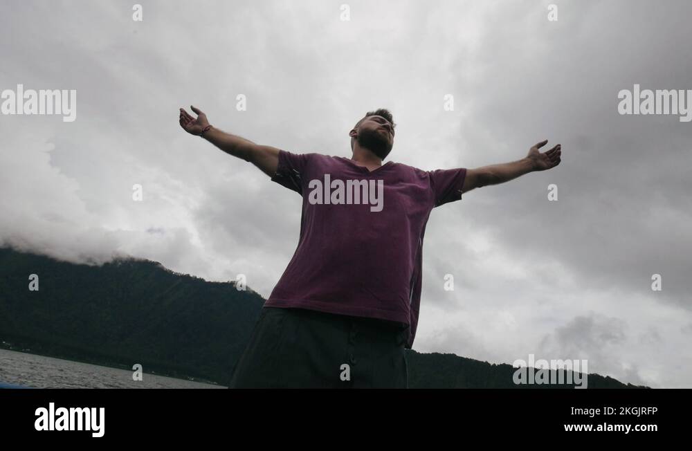Man hands raised sky Stock Videos & Footage - HD and 4K Video Clips - Alamy