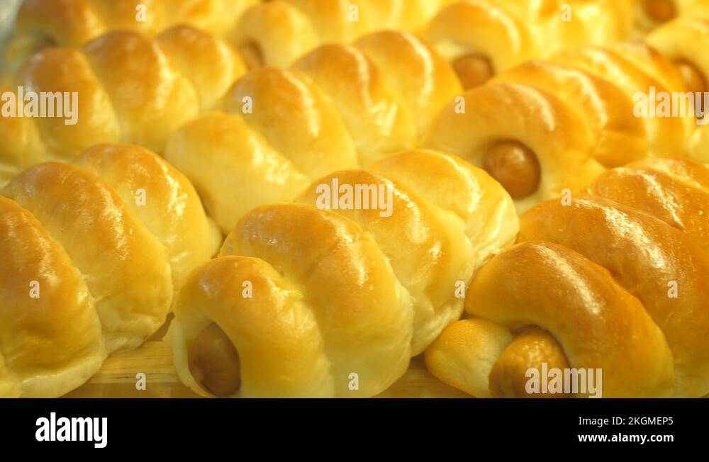 Sausage In Dough Background On Display At Supermarket Stock Video