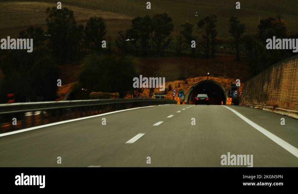 Driving into tunnel on Sicily highway in Italy Stock Video Footage Alamy