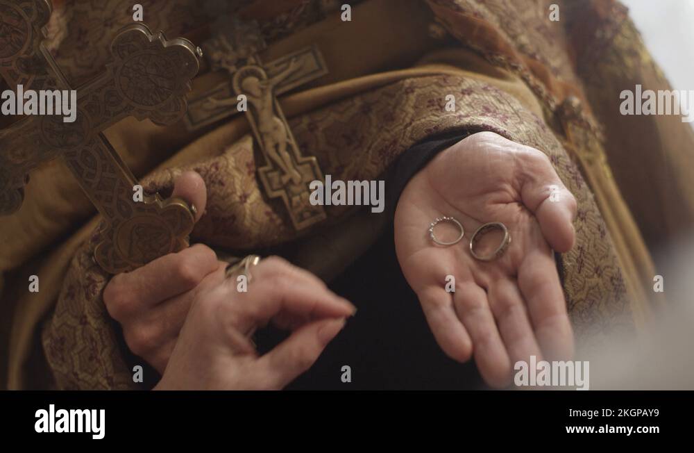 Priest Rings Priest marries an elderly couple wedding rings Stock Video Footage - Alamy