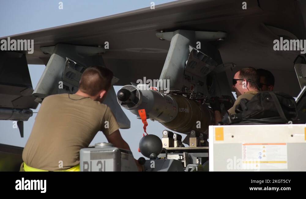 Airmen securing ordnance to F35A Lightning II at Al Dhafra Air Base