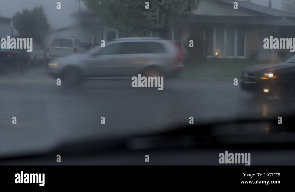 Driving in the rain first person perspective. Looking out the