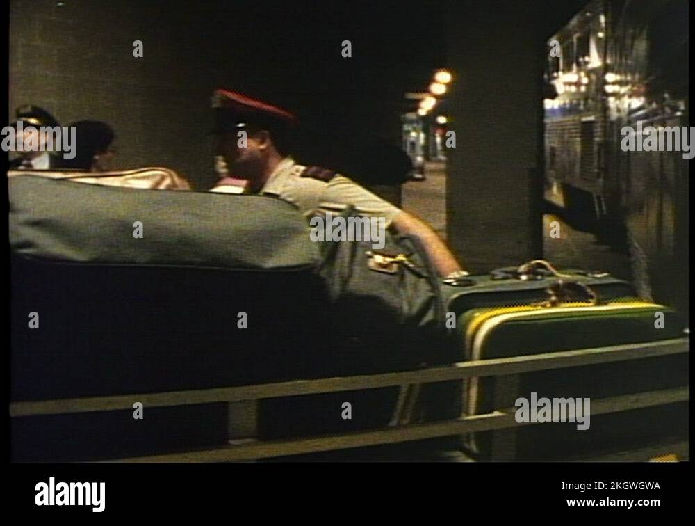 CHICAGO, ILLINOIS, 1994, Porter with luggage for Amtrak's California