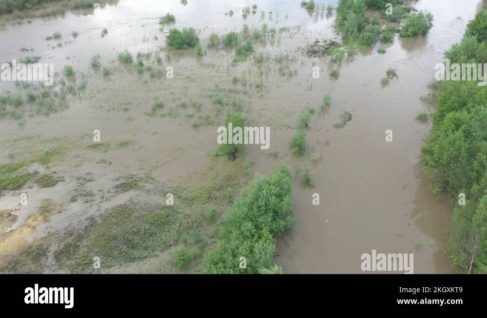 Overflow of water from river body from above 4K aerial video Stock ...