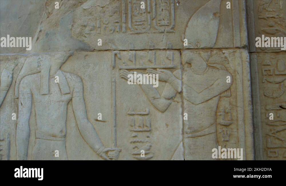 Ancient Egyptian wall carving reliefs at Temple of Kom Ombo, closeup ...