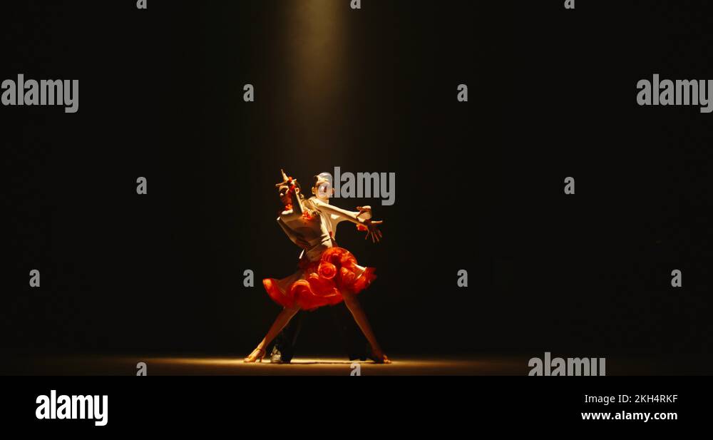 Young asian choreographers starring on stage, performing sport ballroom