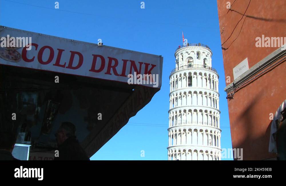 A snack stand serves cold drinks near the Leaning Tower of Pisa in