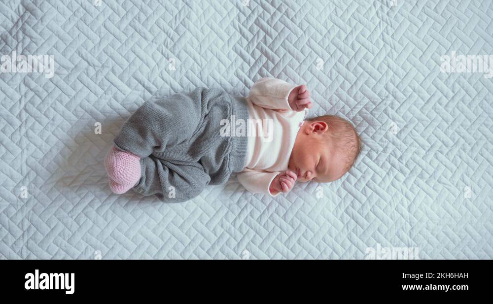 Newborn Baby Sleeping on Mattress Stock Video Footage Alamy