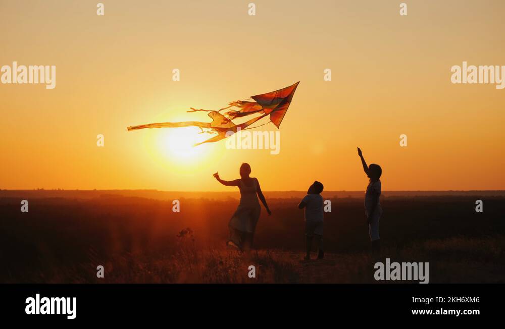 Playing Kite Playing kites Stock Videos & Footage - HD and 4K Video Clips - Alamy