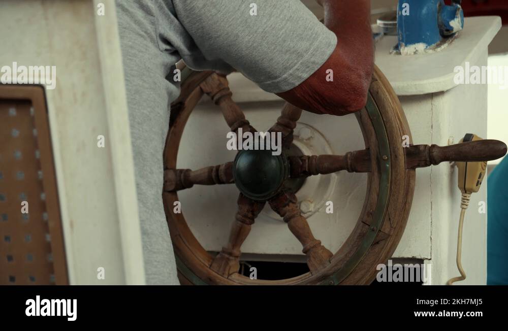 Steering Wheel Of Pleasure Boat.Captain Turns Wooden Steering Wheel