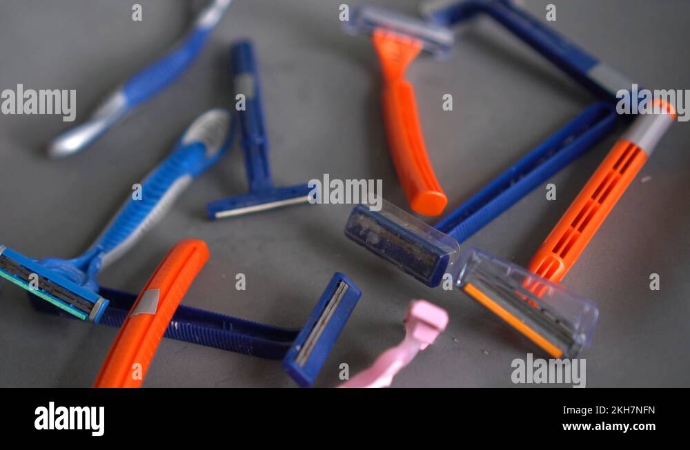 Bunch of old disposable razors. The problem of plastic pollution of the