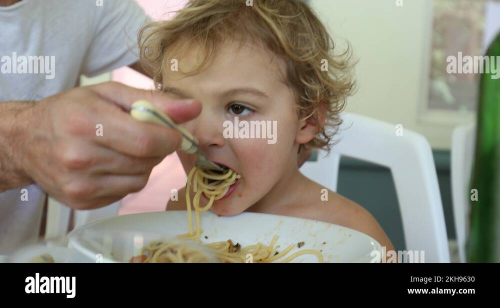 Kids eating noodles Stock Videos & Footage - HD and 4K Video Clips - Alamy