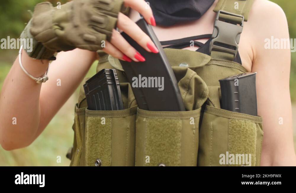 Laser tag game. The game of airsoft. Soldier check weapons. Kalashnikov