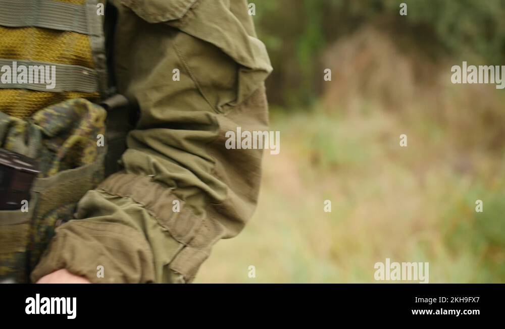 Laser tag game. The game of airsoft. Soldier check weapons. Men play