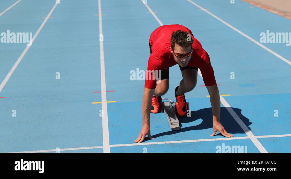 Sprinter in blocks Stock Videos & Footage HD and 4K Video Clips Alamy