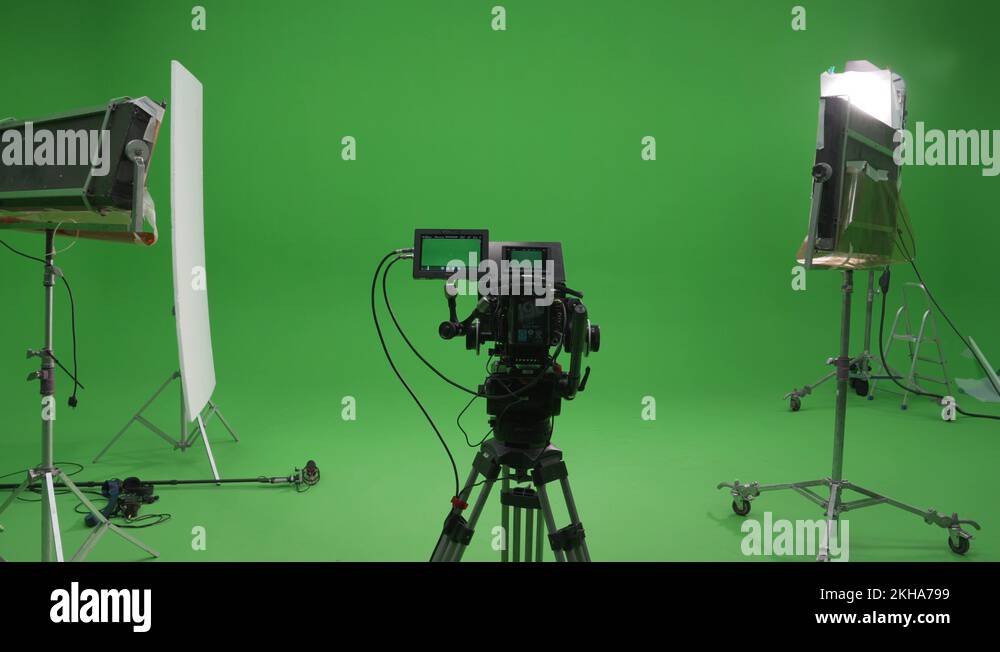 Behind The Scenes filming set red camera on tripod and green screen Stock Video Footage Alamy