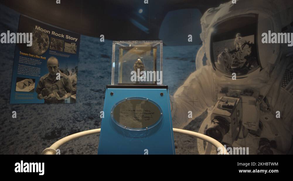 Moon Rock from Apollo 11 in Glass Display Case in Space Museum Stock