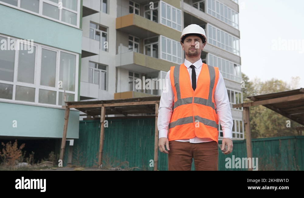 A worker stands at a construction site Stock Videos & Footage HD and